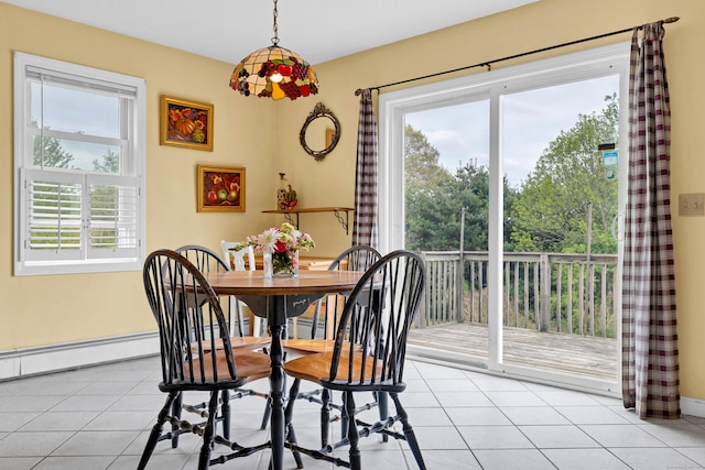 686 W Rd, Salem, CT 06420 - dining area with light tile patterned flooring and baseboards