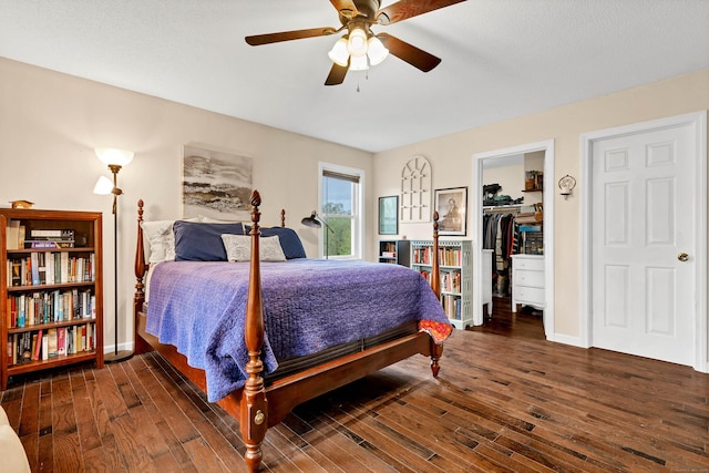 686 W Rd, Salem, CT 06420 - bedroom with wood-type flooring, a spacious closet, a ceiling fan, and a closet