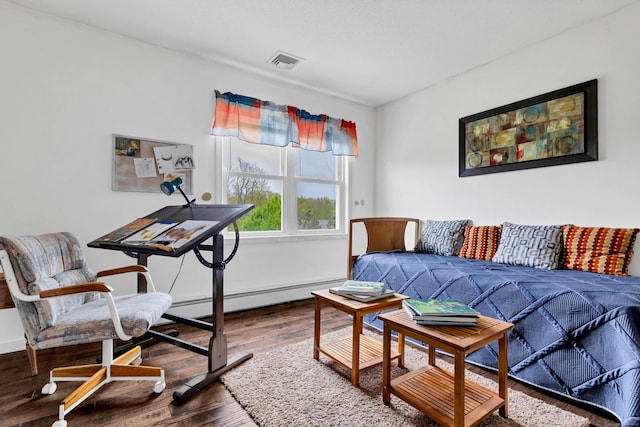 686 W Rd, Salem, CT 06420 - bedroom featuring a baseboard radiator, wood finished floors, and baseboards
