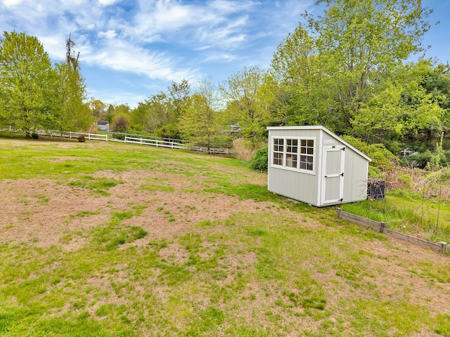 686 W Rd, Salem, CT 06420 - view of yard with fence, a storage unit, and an outbuilding