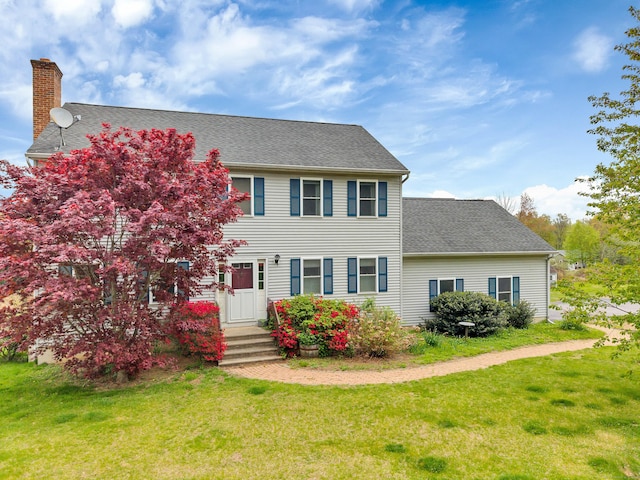686 W Rd, Salem, CT 06420 - view of front of house featuring a front lawn, a chimney, and a shingled roof