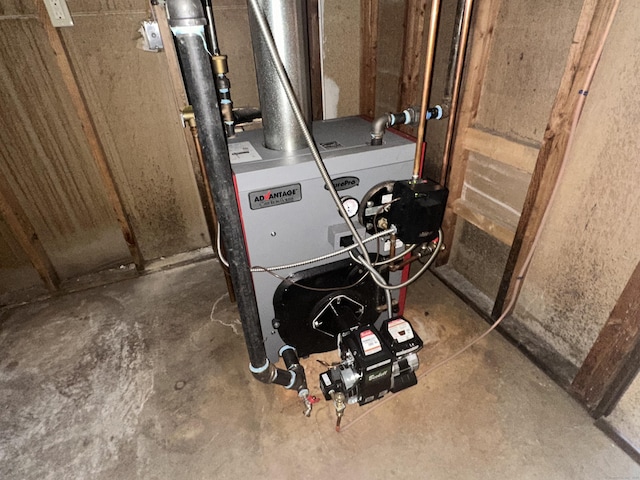 utility room featuring a heating unit