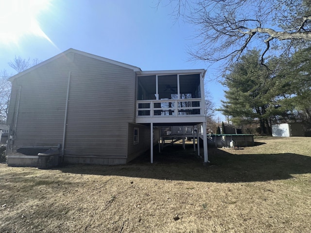 back of property featuring a sunroom