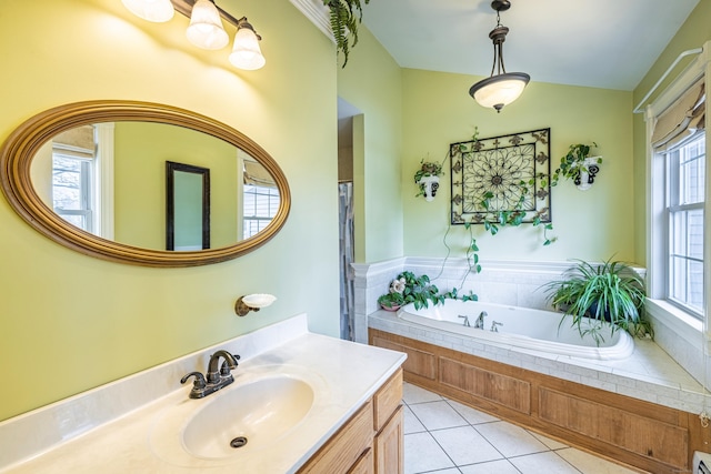 full bathroom featuring tile patterned flooring, a baseboard heating unit, a bath, and vanity