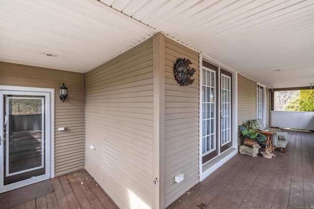 wooden terrace with a porch