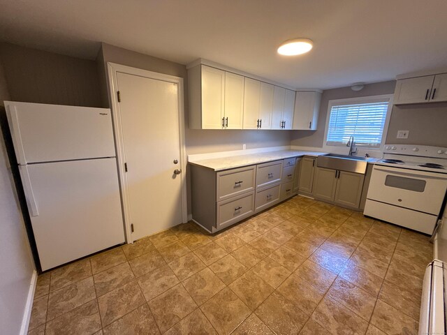 223 Rte 169, Woodstock, CT 06281 - kitchen with a sink, white appliances, gray cabinetry, and light countertops