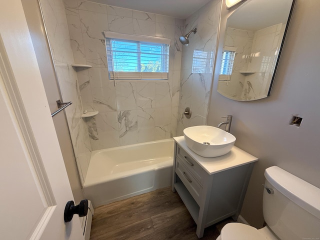 223 Rte 169, Woodstock, CT 06281 - full bathroom featuring a baseboard heating unit, toilet, bathtub / shower combination, wood finished floors, and vanity