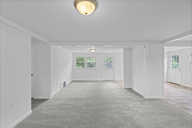 26 Oconnell Rd, East Haddam, CT 06423 - carpeted empty room with healthy amount of natural light, baseboards, and tile patterned floors