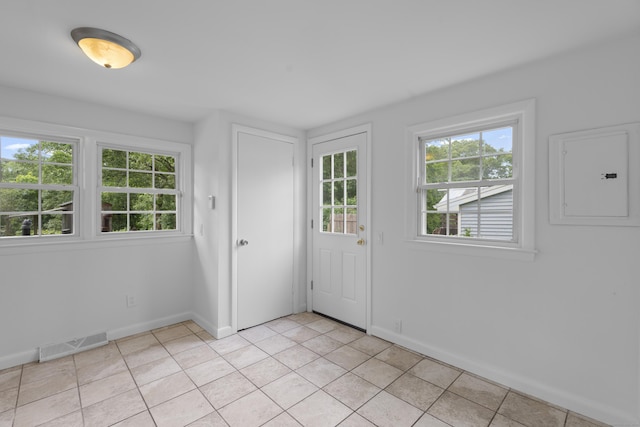 26 Oconnell Rd, East Haddam, CT 06423 - foyer featuring electric panel, light tile patterned flooring, and baseboards