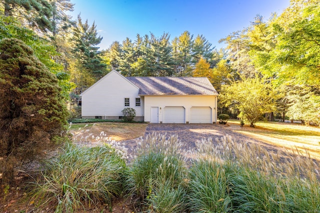 exterior space featuring a garage