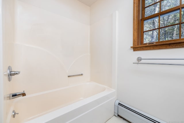 full bathroom with bathtub / shower combination and a baseboard radiator