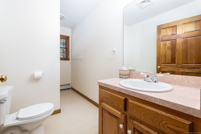 bathroom featuring vanity, visible vents, baseboards, a baseboard heating unit, and toilet