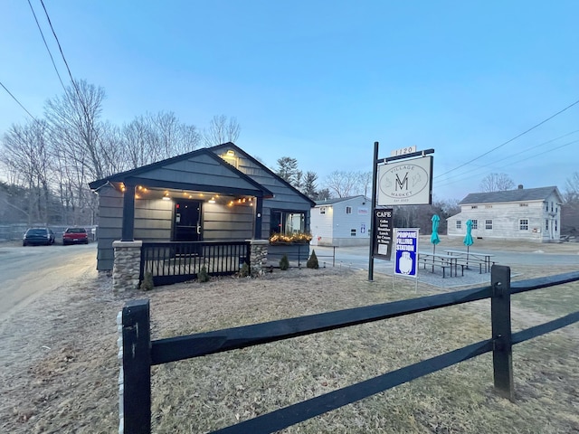 view of front of home with fence