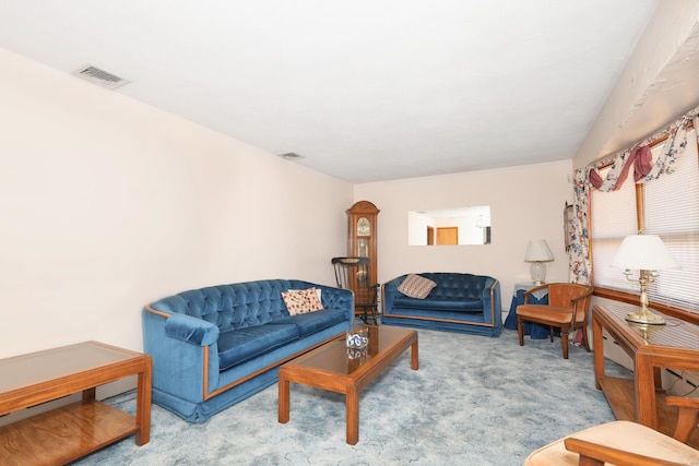 carpeted living room with visible vents