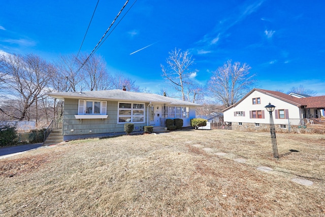 single story home featuring a chimney