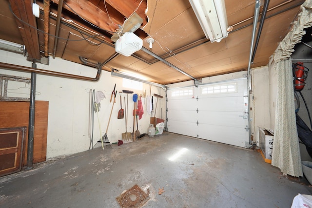 garage featuring a garage door opener