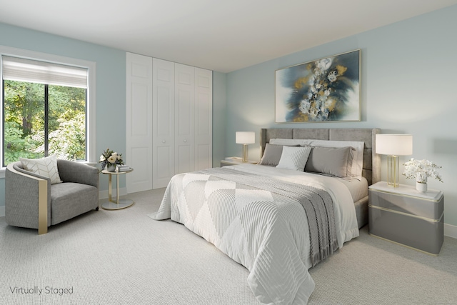 bedroom with a closet, baseboards, and carpet