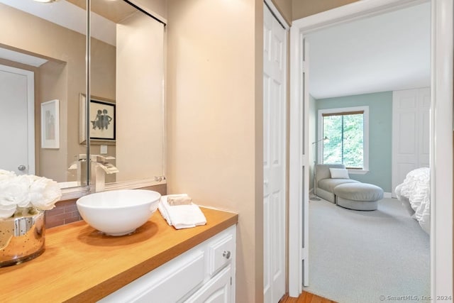 bathroom with vanity and backsplash