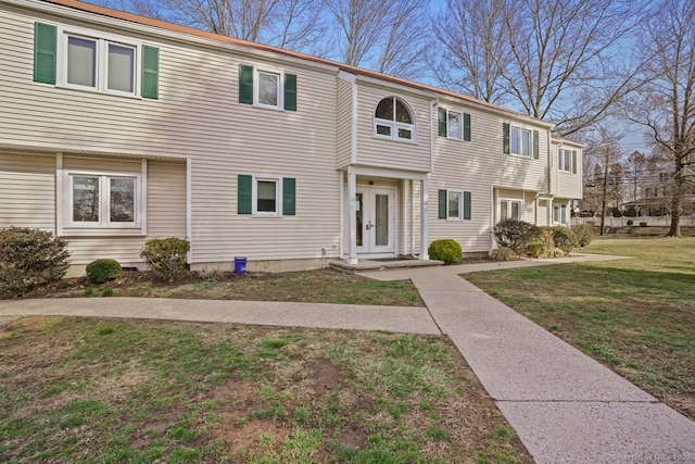 multi unit property with a front lawn