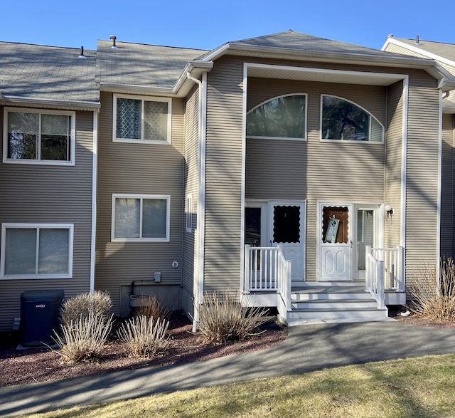 view of front of house with central air condition unit