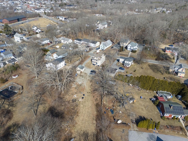 birds eye view of property with a residential view