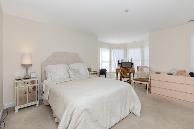 carpeted bedroom with visible vents