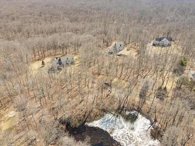 bird's eye view featuring a view of trees