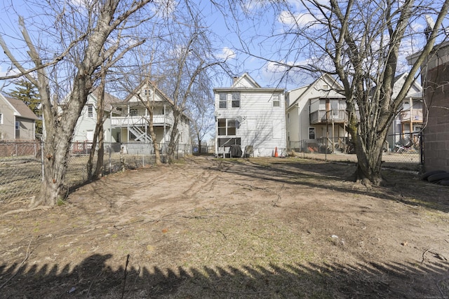 view of yard featuring a residential view and fence