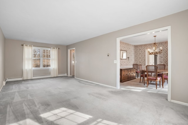 living area featuring baseboards, light colored carpet, an inviting chandelier, and wallpapered walls