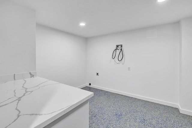 washroom with recessed lighting, baseboards, and electric dryer hookup