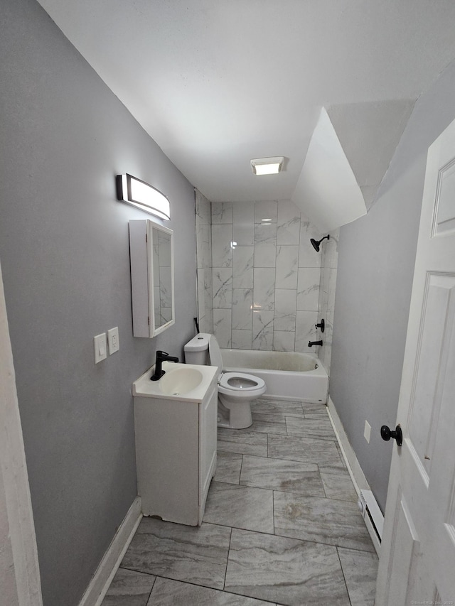 bathroom featuring vanity, baseboards, shower / bathing tub combination, toilet, and baseboard heating