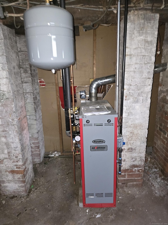 utility room featuring a heating unit