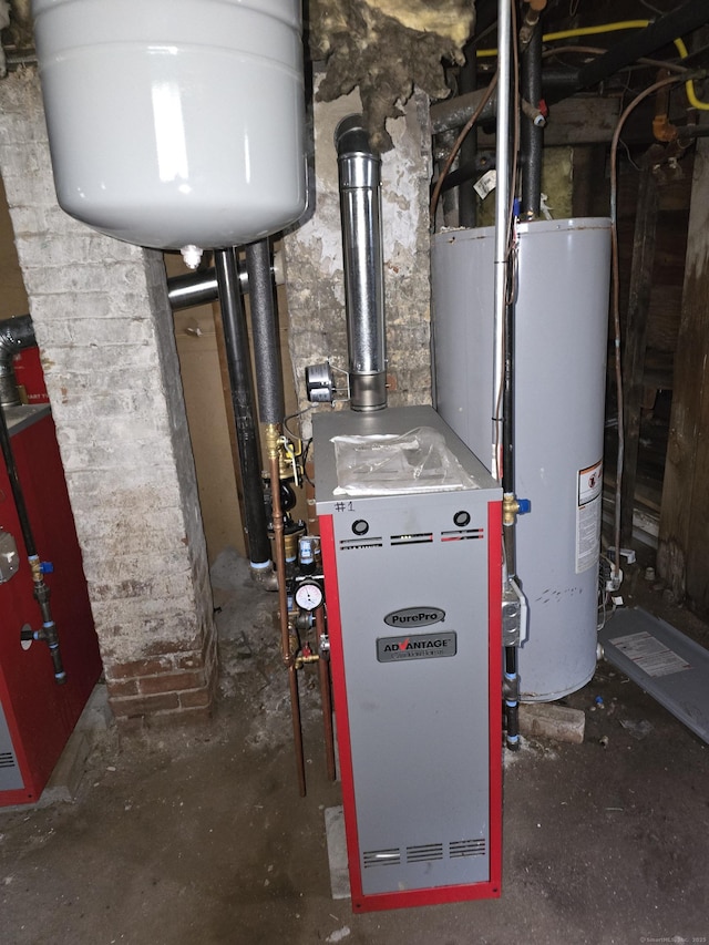 utility room with water heater and a heating unit