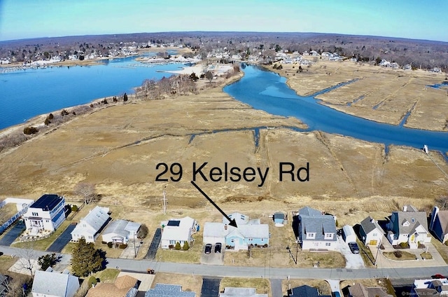 birds eye view of property featuring a residential view and a water view