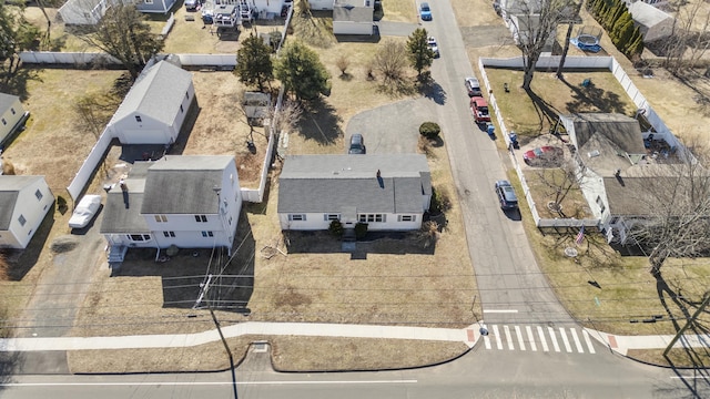 birds eye view of property with a residential view