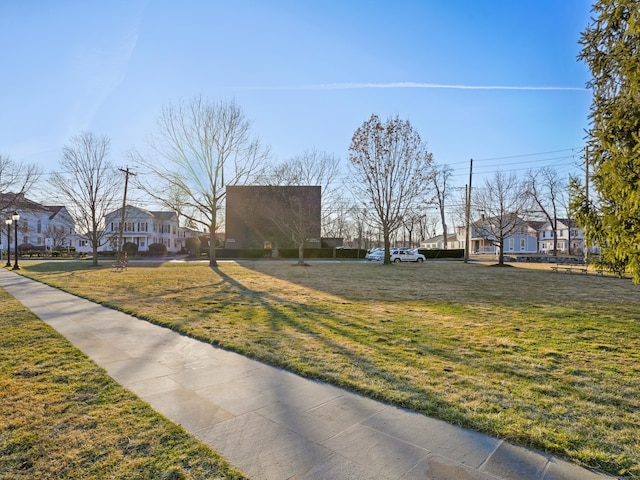 view of yard featuring a residential view