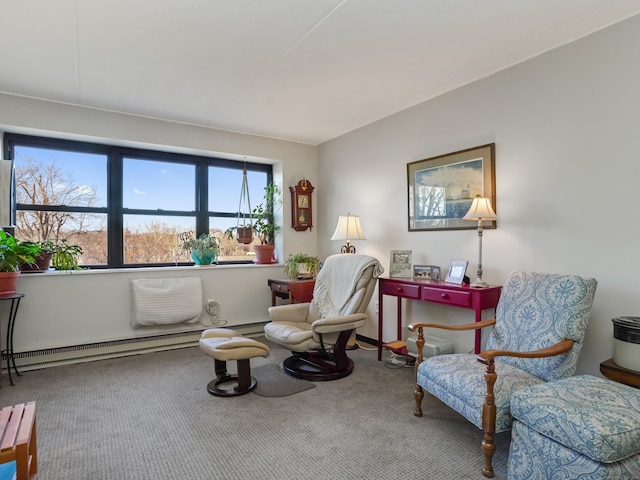 living area with carpet flooring and a baseboard radiator