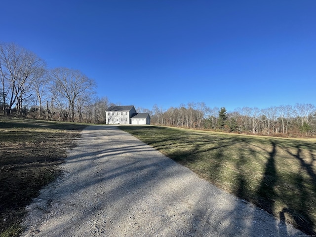 view of road with driveway