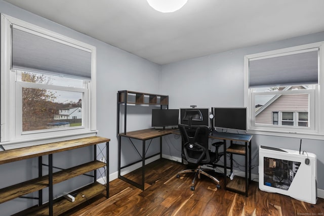 home office with wood finished floors and baseboards