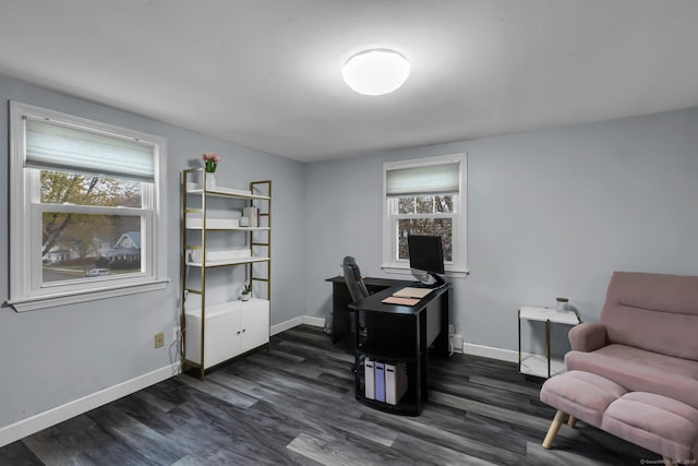 office area with baseboards and dark wood-style flooring