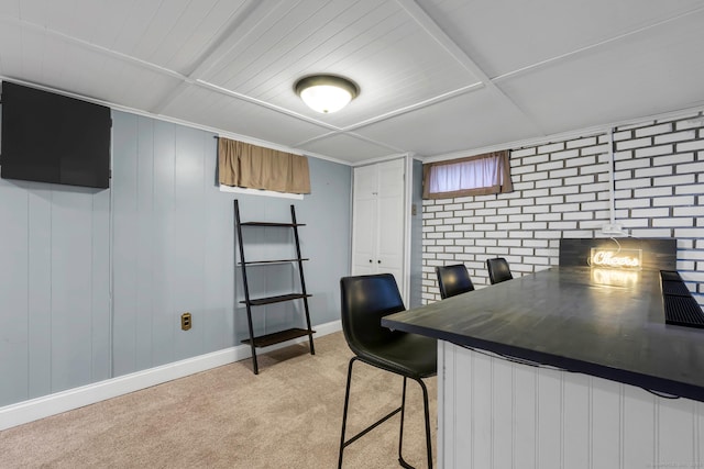 office with light colored carpet and baseboards