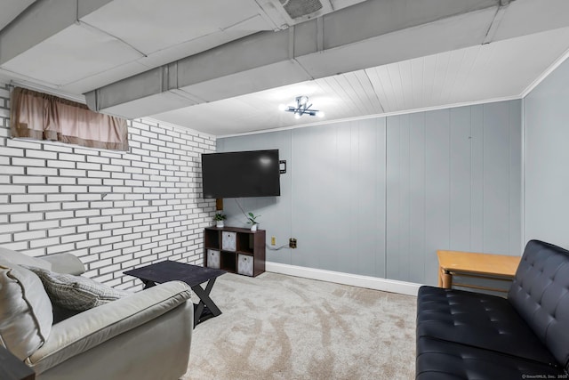 living room with crown molding, baseboards, and carpet floors