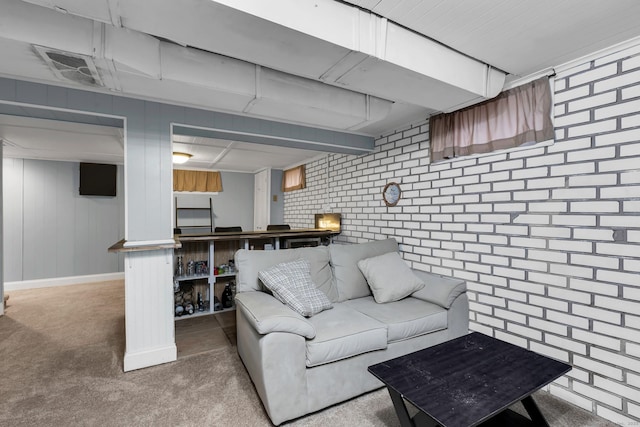 carpeted living area with baseboards and visible vents