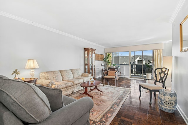 living room featuring baseboards and ornamental molding