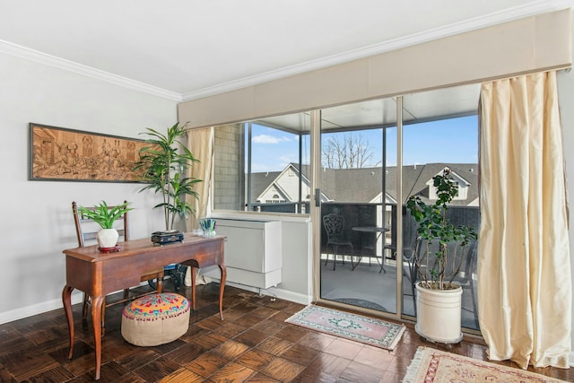 doorway to outside featuring baseboards and ornamental molding