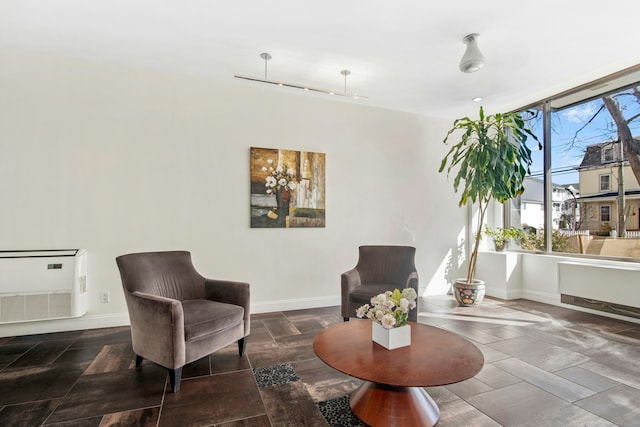 living area with baseboards