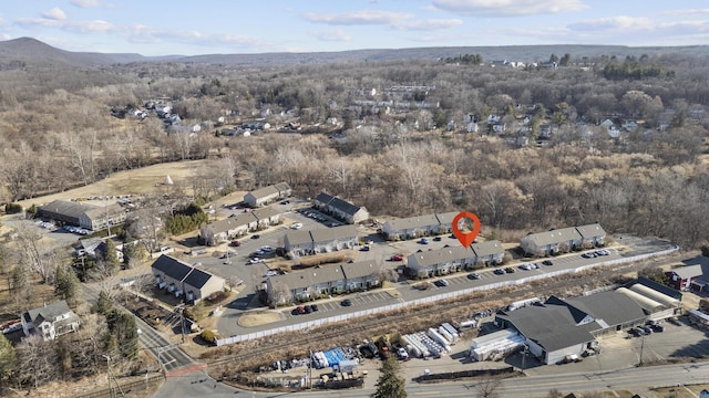 bird's eye view featuring a forest view