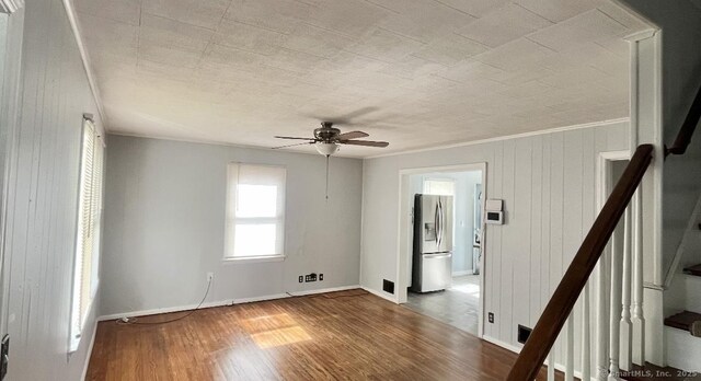 84 Glendale Ave, Bridgeport, CT 06606 - spare room with a ceiling fan, wood finished floors, stairs, baseboards, and crown molding