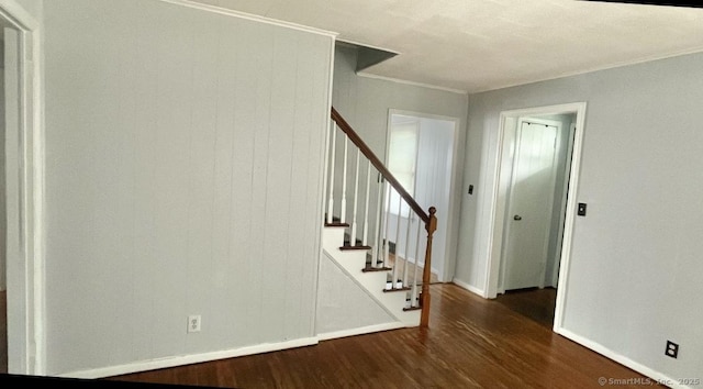 84 Glendale Ave, Bridgeport, CT 06606 - entrance foyer with wood finished floors, ornamental molding, stairs, and baseboards