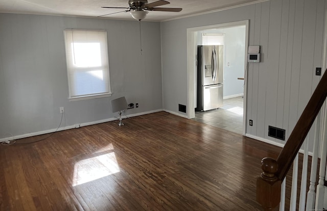 84 Glendale Ave, Bridgeport, CT 06606 - empty room with ceiling fan, wood finished floors, baseboards, ornamental molding, and stairs